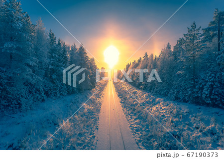 Snowy winter railroad view. First snow sunset landscape. Photo from Sotkamo, Finland. 67190373