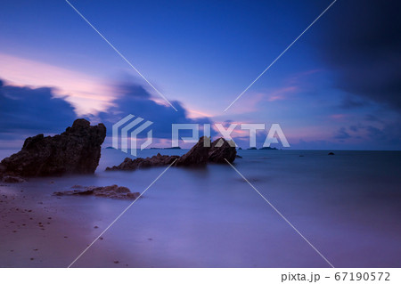 Motion seascape with stone arch at dawn Motion seascape with stone arch at dawn 67190572