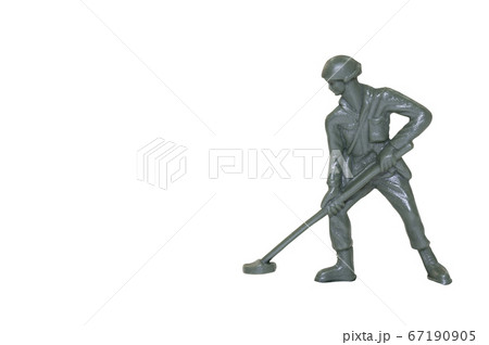 Miniature toy soldier on white background Miniature toy soldier on white background 67190905