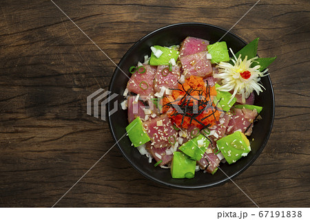 Tuna Poke Bowl with Avocado ontop Ebiko Tuna Poke Bowl with Avocado ontop Ebiko 67191838