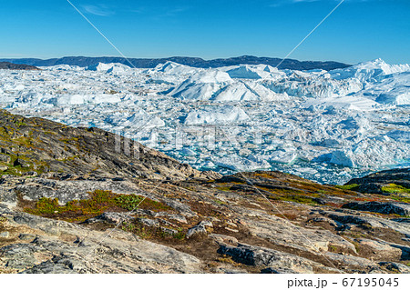 Icebergs from melting glacier in icefjord - Global Warming and Climate Change Icebergs from melting glacier in icefjord - Global Warming and Climate Change 67195045