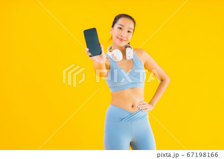 Portrait beautiful young asian woman wear sport wear with smart phone 67198166