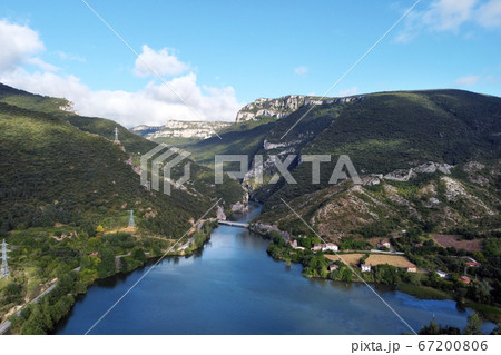 Aerial view of El Sobron lake and Ebro river canyon in Burgos, Castilla y Leon, Spain. Aerial view of El Sobron lake and Ebro river canyon in Burgos, Castilla y Leon, Spain. 67200806