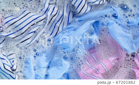 Color clothes soak in powder detergent water Color clothes soak in powder detergent water 67201862