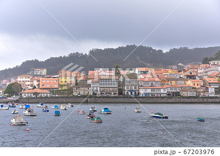 Coastal village in the background and fishing Coastal village in the background and fishing 67203976