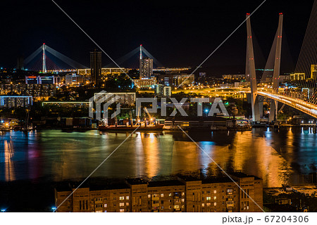 Panorama of night Vladivostok. The bridge through 67204306
