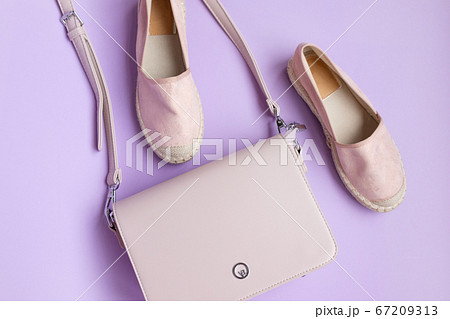 Top view of beautiful stylish shoes with a pastel Top view of beautiful stylish shoes with a pastel 67209313