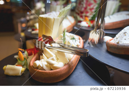 Fresh cheese in clay bowl.Dairy products for breakfast. Fresh cheese in clay bowl.Dairy products for breakfast. 67210936