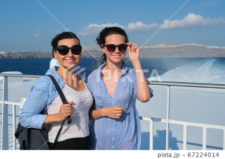 Two traveling women, mother and teenage daughter in luxury travel Mediterranean Two traveling women, mother and teenage daughter in luxury travel Mediterranean 67224014