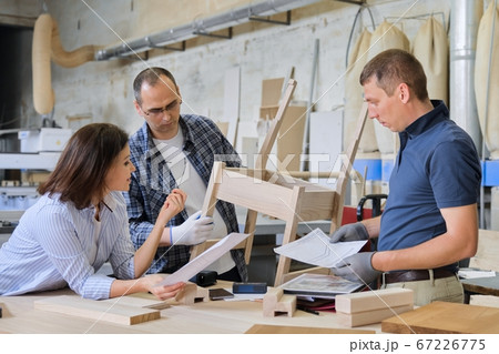 Industrial carpentry workshop, group of working people 67226775