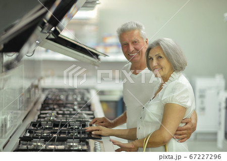 Beautiful senior couple in a shopping center 67227296