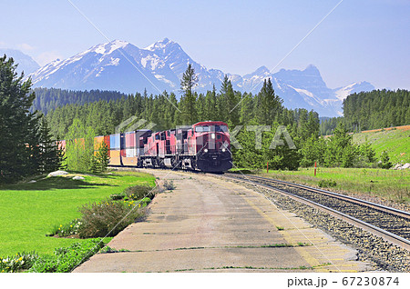 Freight train moves from Vancouver to Calgary. Freight train moves from Vancouver to Calgary. 67230874