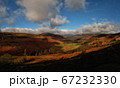 Picturesque mountain valley in sunset tones 67232330