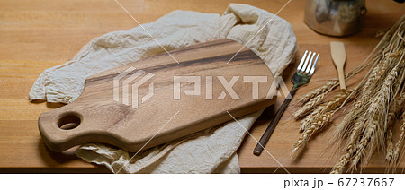 Mock-up wooden tray above napkins on wooden Mock-up wooden tray above napkins on wooden 67237667