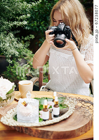 Blogger photographing cosmetics Blogger photographing cosmetics 67238077