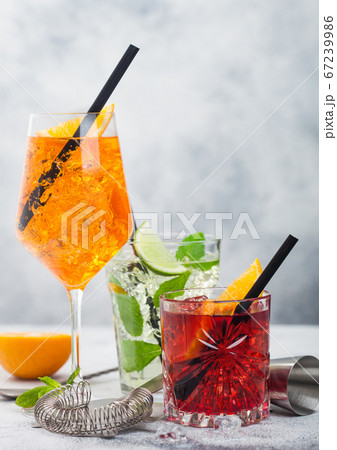 Glasses of spritz,mojito and negroni cocktails 67239986