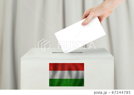 Hungarian Vote concept. Voter hand holding ballot 67244785