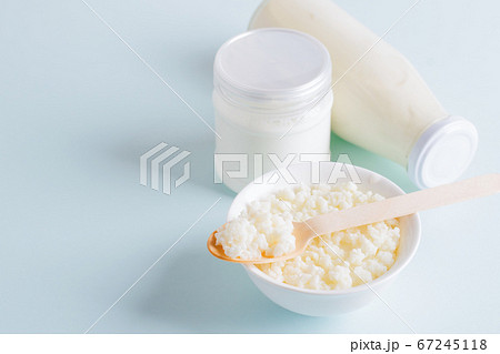 Milk mushroom organic probiotic fermented milk products glass bowl. Fermented foods healthy eating concept. Copy space. Milk mushroom organic probiotic fermented milk products glass bowl. Fermented foods healthy eating concept. Copy space. 67245118