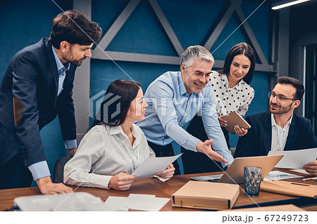 Male boss holding a meeting in the office Male boss holding a meeting in the office 67249723