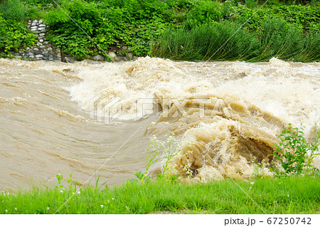 Tenryu river after heavy rain in Iida city Tenryu river after heavy rain in Iida city 67250742