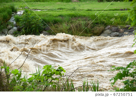 Tenryu river after heavy rain in Iida city 67250751
