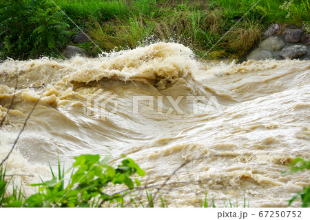 Tenryu river after heavy rain in Iida city 67250752
