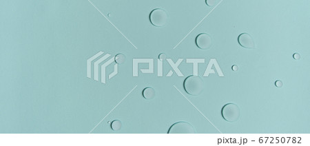 drops of water on the surface of the fabric. 67250782