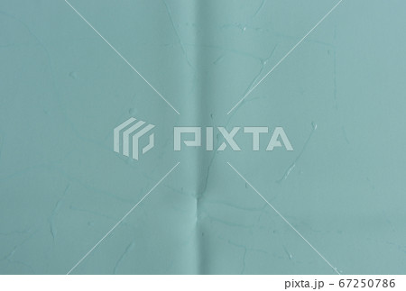 drops of water on the surface of the fabric. 67250786