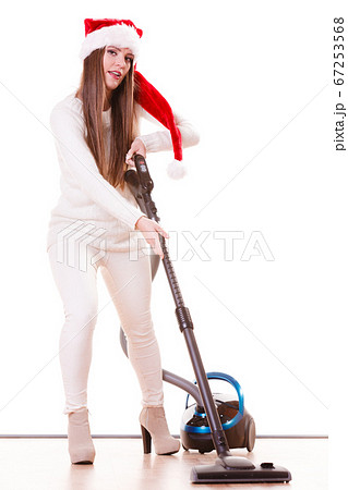 Girl santa claus hat with vacuum cleaner Girl santa claus hat with vacuum cleaner 67253568