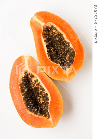 Fresh papaya fruit on the white background Fresh papaya fruit on the white background 67255073