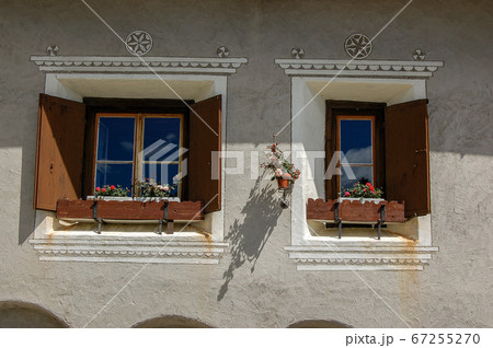 Wooden windows and decorations - Zuoz village Engadine Switzerland 67255270