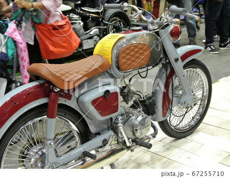 KUALA LUMPUR, MALAYSIA -SEPTEMBER 25, 2016: Custom motorcycle. Customized from old motorcycle model by the designer to fulfill their passion and creativity. KUALA LUMPUR, MALAYSIA -SEPTEMBER 25, 2016: Custom motorcycle. Customized from old motorcycle model by the designer to fulfill their passion and creativity. 67255710
