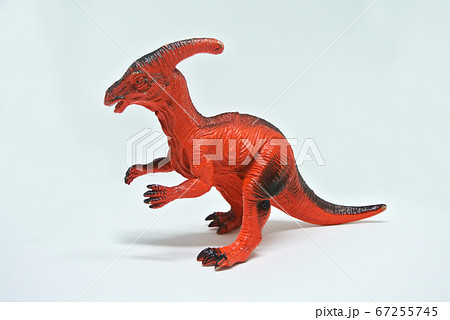 2 leg toys dinosaur in red color and made of plastic isolated in white background. 2 leg toys dinosaur in red color and made of plastic isolated in white background. 67255745