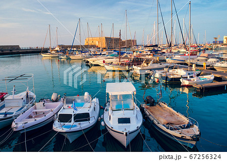 Venetian Fort in Heraklion and moored fishing boats, Crete Island, Greece 67256324