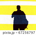 Silhouette of a man on crosswalk 67256797