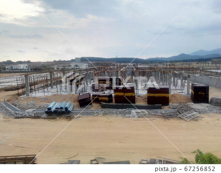 KUALA LUMPUR, MALAYSIA -AUGUST 25, 2017: Construction site in progress during daytime. Construction of the structure of the building is on-going. KUALA LUMPUR, MALAYSIA -AUGUST 25, 2017: Construction site in progress during daytime. Construction of the structure of the building is on-going. 67256852