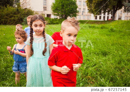 The cute kids looking forward to gifts 67257145