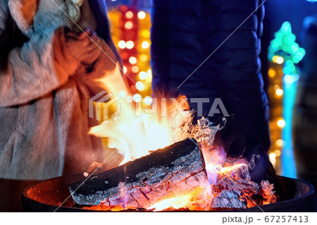 The fire, people warming hands, Bulboaca, Moldova The fire, people warming hands, Bulboaca, Moldova 67257413