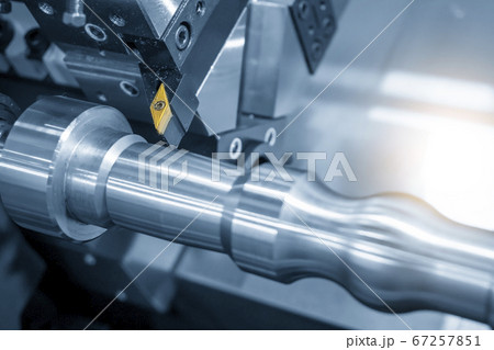 The CNC lathe machine finish cutting the metal shaft. The CNC lathe machine finish cutting the metal shaft. 67257851