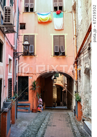 Narrow street in Sanremo, Italy 67259502