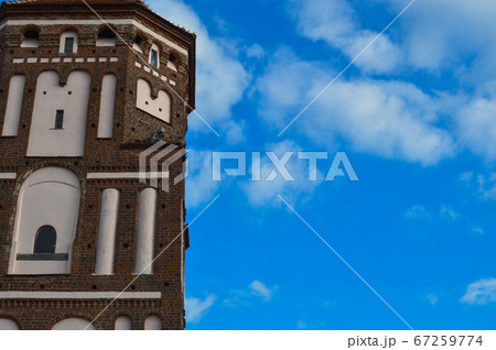 Tall steeples and towers, the roof of an old Tall steeples and towers, the roof of an old 67259774