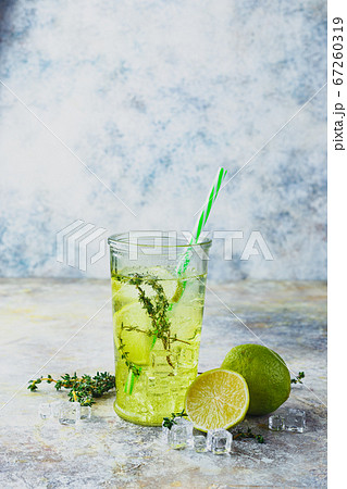 Lime Lemonade with thyme and ice. Lime Lemonade with thyme and ice. 67260319