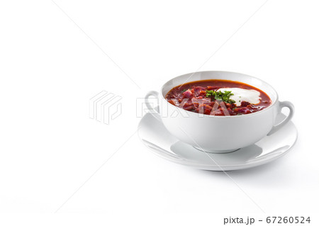 Traditional Ukrainian Russian borsch. Beetroot soup isolated on white background Traditional Ukrainian Russian borsch. Beetroot soup isolated on white background 67260524