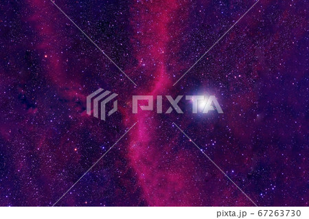 Red galaxy with stars and nebulae in deep space. 67263730