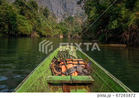Wooden boat with life vests at Konglor Cave, Thakhek, Laos 67263872