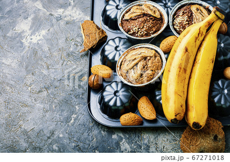Banana muffins with nuts. Banana muffins with nuts. 67271018