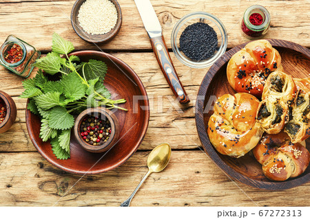 Appetizing bun with nettles. 67272313