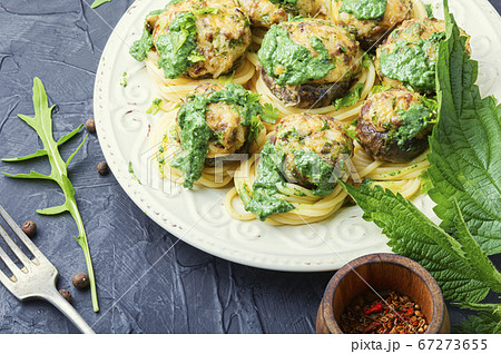 Mushrooms stuffed with minced meat. 67273655