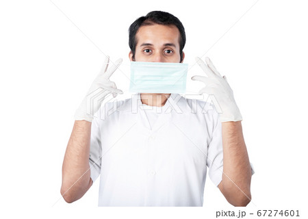 Asian doctor man in protective gloves wearing a 67274601