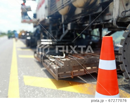 Road maintenance by the ASPHALT HOT MIX IN - PLACE 67277076